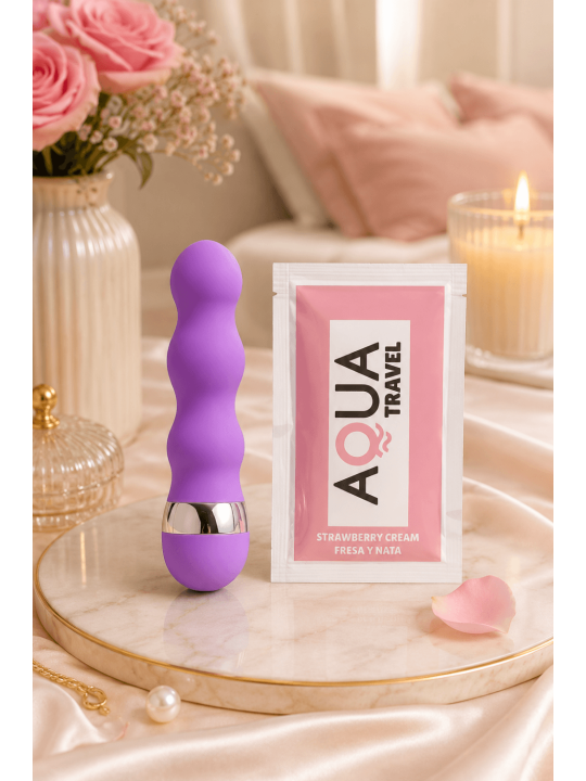 Mini Vibromasseur violet ondulés Pocket Pleasure  1 dosette de lubrifiant